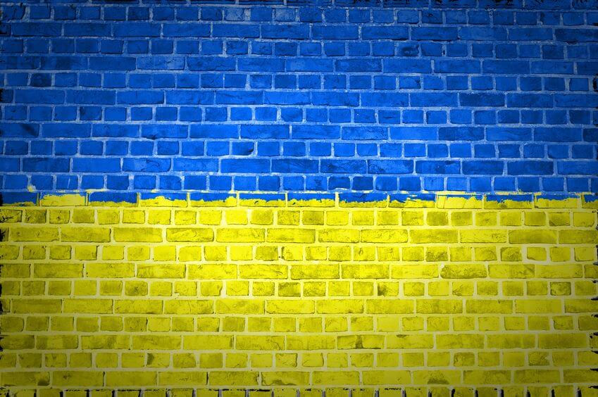 Brick Wall Flag Supporting Ukraine - Humanitarian Aid Donations